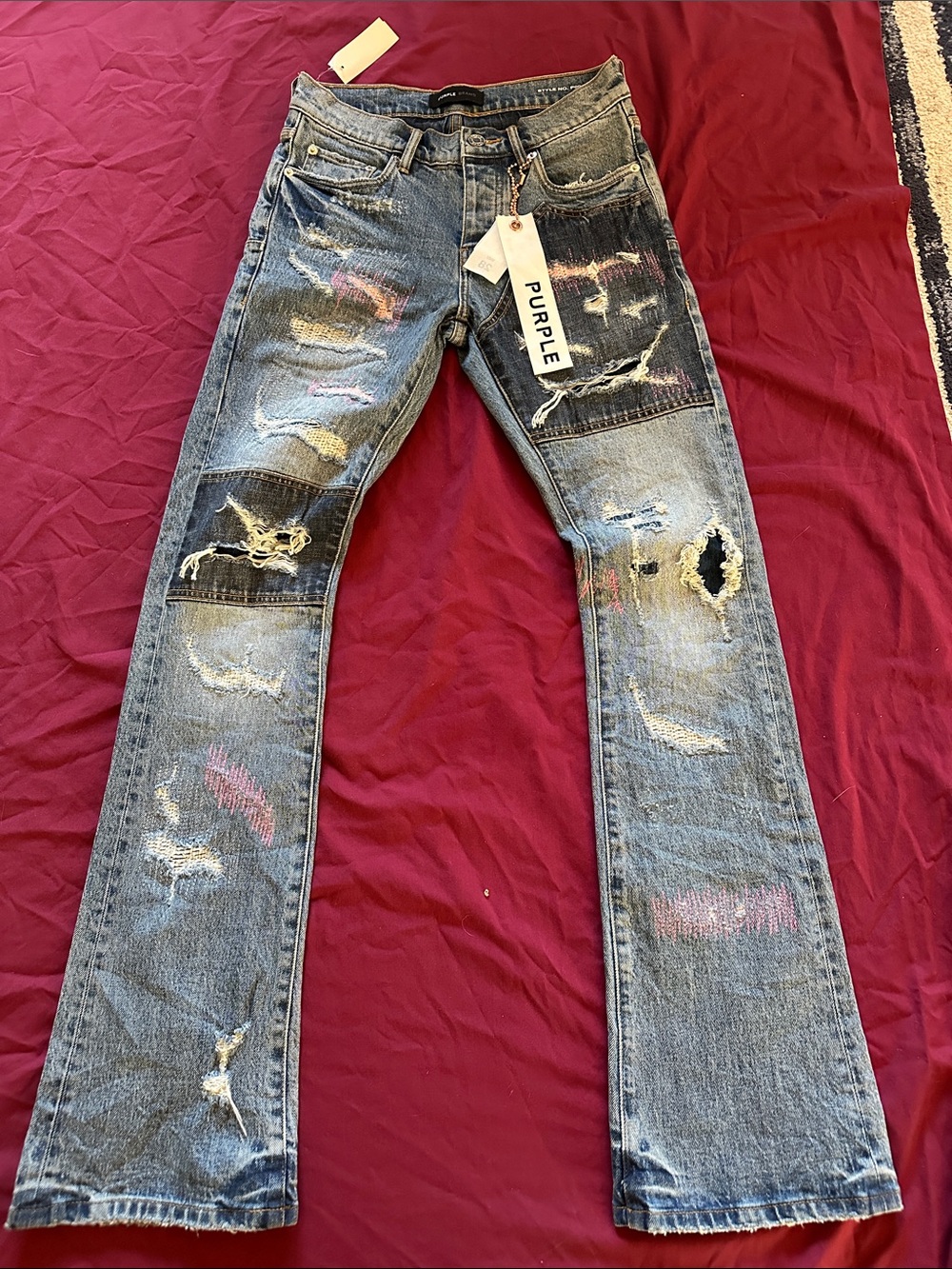 Purple Brand Men's Blue Distressed Bootcut Jeans with Multicolor Paint